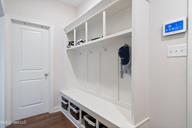 mudroom with dark hardwood / wood-style flooring