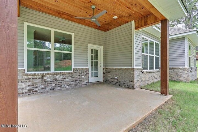 view of patio featuring ceiling fan