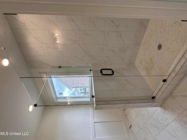 1805 Bakersfield Way, Nesbit, MS 38651 - bathroom featuring a skylight and marble finish flooring
