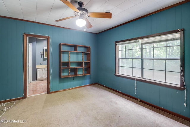 3008 Papania Ln, Gulfport, MS 39501 - unfurnished room with carpet, ornamental molding, a ceiling fan, and baseboards