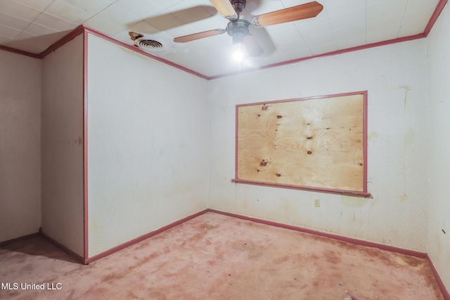 3008 Papania Ln, Gulfport, MS 39501 - empty room featuring crown molding, carpet, ceiling fan, and baseboards