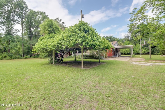 3008 Papania Ln, Gulfport, MS 39501 - view of grassy yard with a carport
