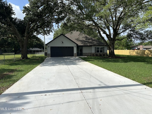 3076 Highland Ave, Diberville, MS 39540 - ranch-style home with a garage and concrete driveway