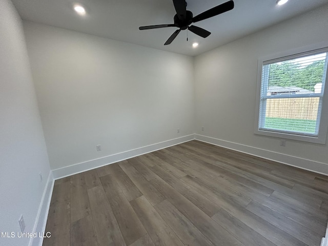 3076 Highland Ave, Diberville, MS 39540 - unfurnished room featuring recessed lighting, dark wood finished floors, ceiling fan, and baseboards