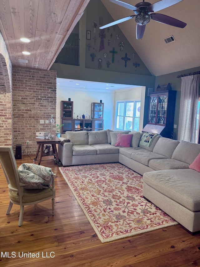 236 Sawbridge Dr, Ridgeland, MS 39157 - living area featuring high vaulted ceiling, ceiling fan, hardwood / wood-style floors, and brick wall