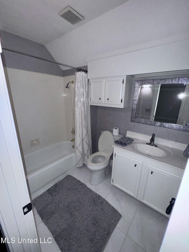 236 Sawbridge Dr, Ridgeland, MS 39157 - bathroom with toilet, vanity, shower / tub combo, vaulted ceiling, and tile patterned floors
