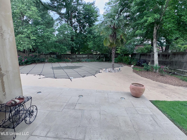 236 Sawbridge Dr, Ridgeland, MS 39157 - fenced backyard with a patio