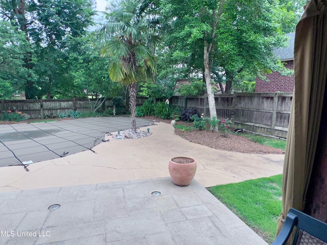 236 Sawbridge Dr, Ridgeland, MS 39157 - fenced backyard featuring a patio