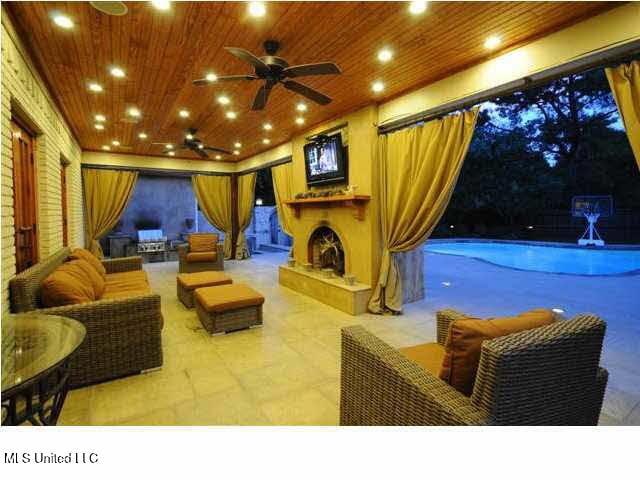 236 Sawbridge Dr, Ridgeland, MS 39157 - home theater with wood ceiling and a ceiling fan