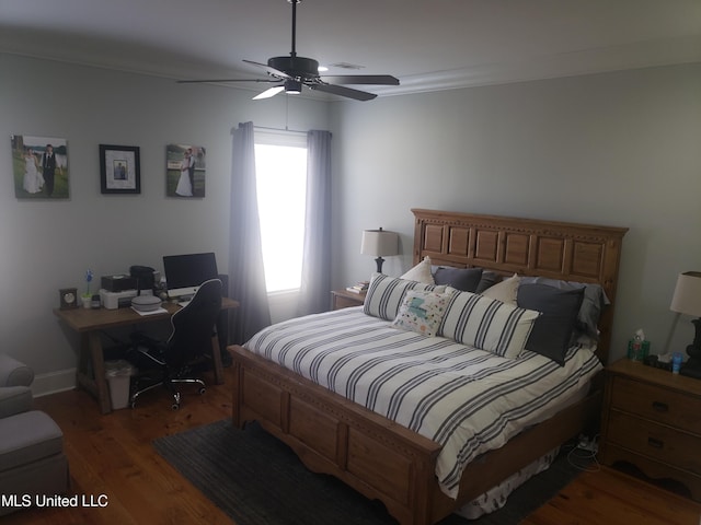 bedroom featuring wood-type flooring and ceiling fan