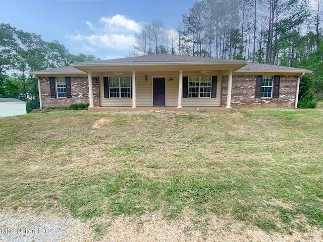 ranch-style home with a front yard