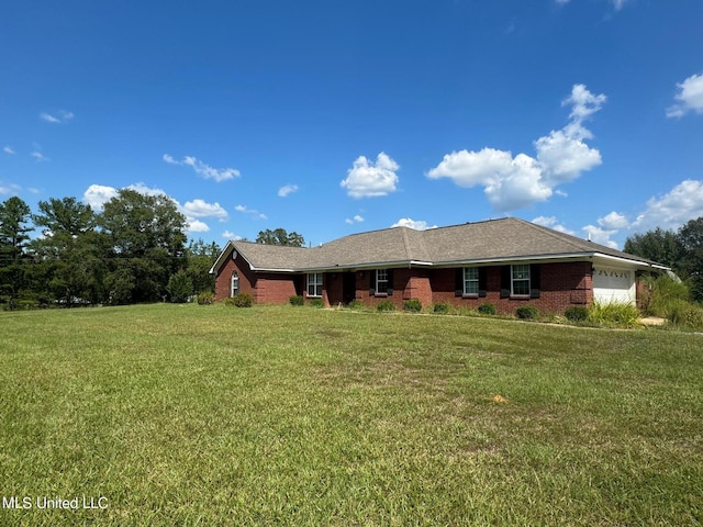 3820 Beamon Rd, Kosciusko, MS 39090 - ranch-style house with brick siding, a front lawn, and an attached garage