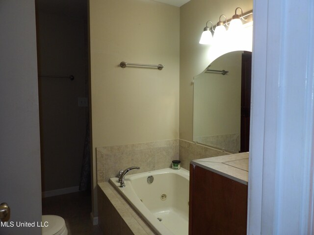 3820 Beamon Rd, Kosciusko, MS 39090 - full bath with toilet, a jetted tub, and vanity