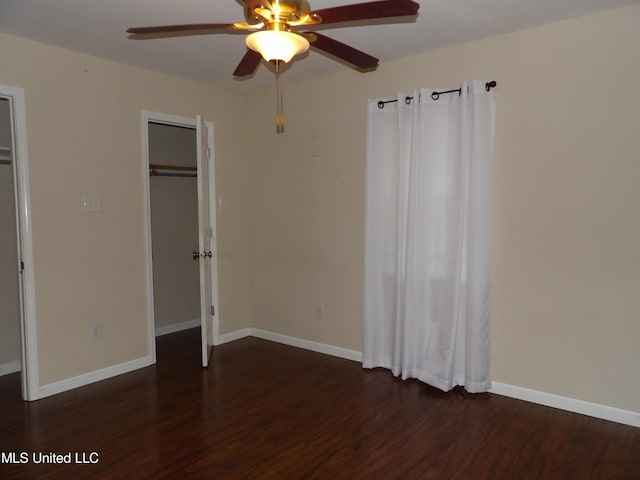 3820 Beamon Rd, Kosciusko, MS 39090 - unfurnished bedroom with wood finished floors, a ceiling fan, and baseboards