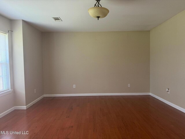 3820 Beamon Rd, Kosciusko, MS 39090 - empty room with visible vents, wood finished floors, and baseboards