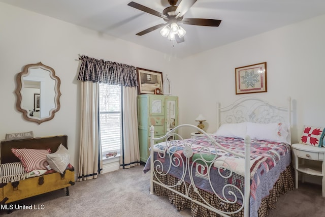 carpeted bedroom with a ceiling fan