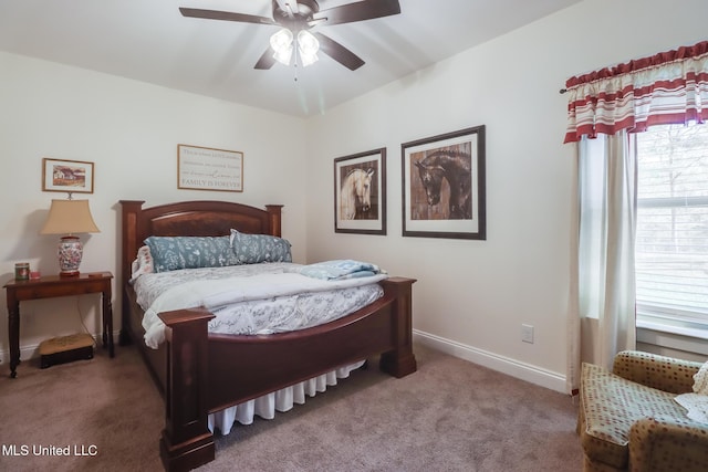 bedroom with carpet, baseboards, and ceiling fan