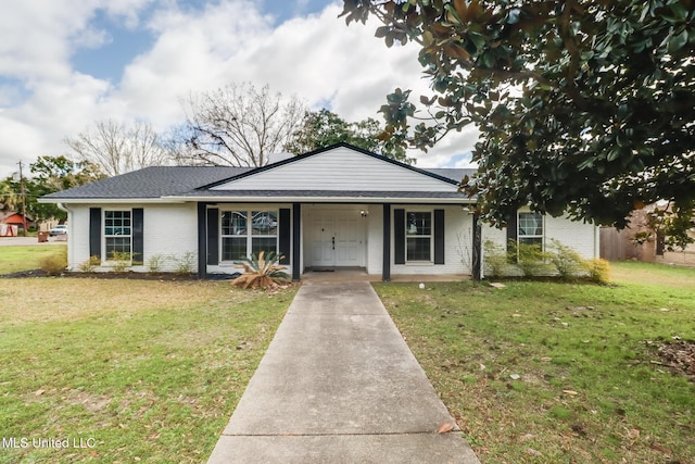 ranch-style house featuring brick siding, a porch, and a front lawn