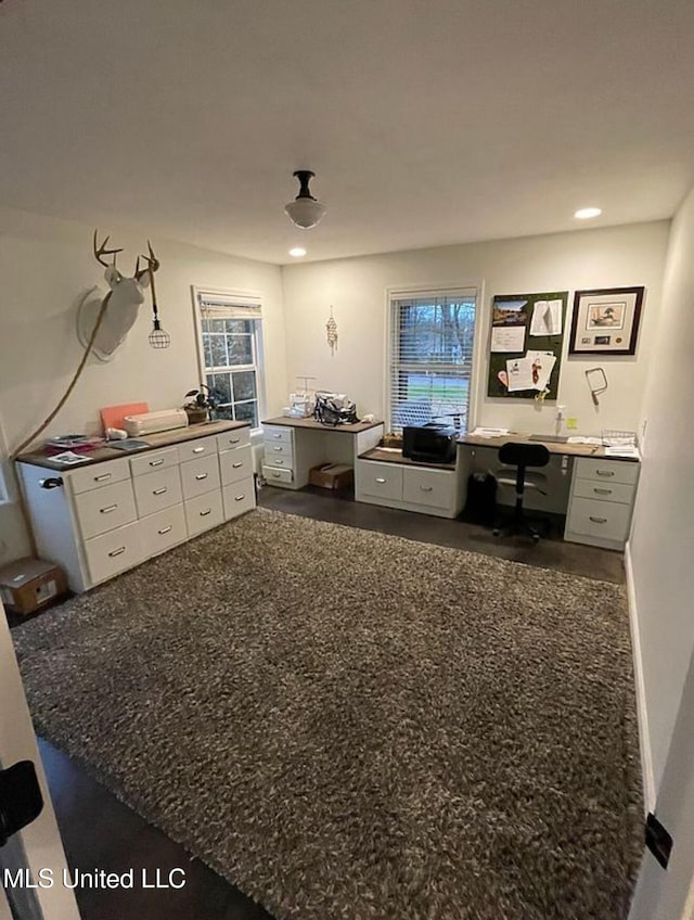 interior space with recessed lighting and built in study area