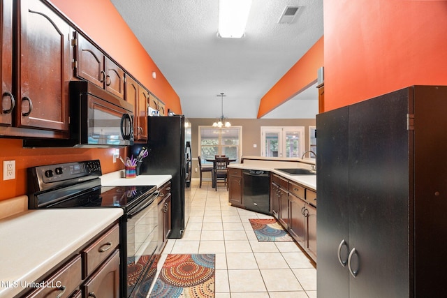 639 Plantation Way, Byhalia, MS 38611 - kitchen featuring black appliances, a sink, a chandelier, light tile patterned floors, and light countertops