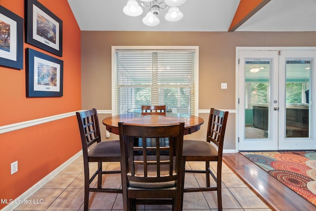 639 Plantation Way, Byhalia, MS 38611 - dining room with french doors, a chandelier, light tile patterned floors, and baseboards