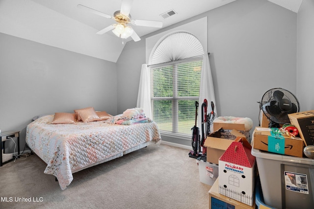 639 Plantation Way, Byhalia, MS 38611 - bedroom with vaulted ceiling, carpet floors, ceiling fan, and baseboards