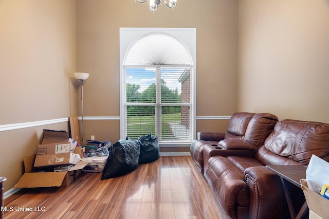 639 Plantation Way, Byhalia, MS 38611 - living room with a chandelier and wood finished floors