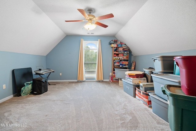 639 Plantation Way, Byhalia, MS 38611 - playroom with lofted ceiling, carpet flooring, a ceiling fan, a textured ceiling, and baseboards