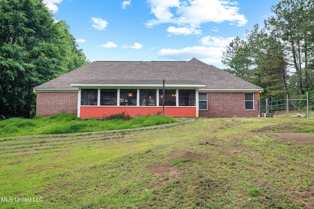 639 Plantation Way, Byhalia, MS 38611 - view of front facade featuring a sunroom, brick siding, and a shingled roof