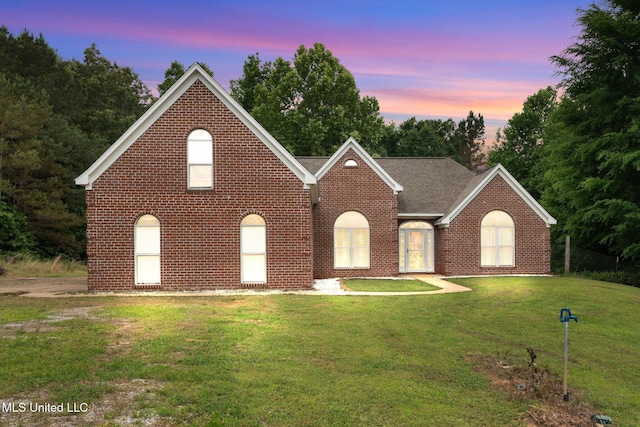 639 Plantation Way, Byhalia, MS 38611 - view of front of property featuring brick siding, a yard, and a shingled roof