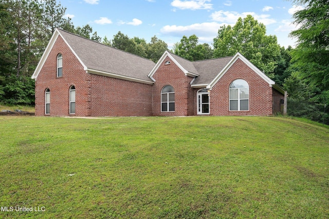 639 Plantation Way, Byhalia, MS 38611 - ranch-style house featuring brick siding, roof with shingles, and a front lawn