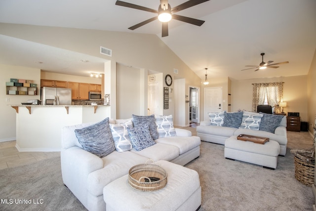 1574 Rachel Dr, Biloxi, MS 39532 - living room with ceiling fan, lofted ceiling, and light colored carpet