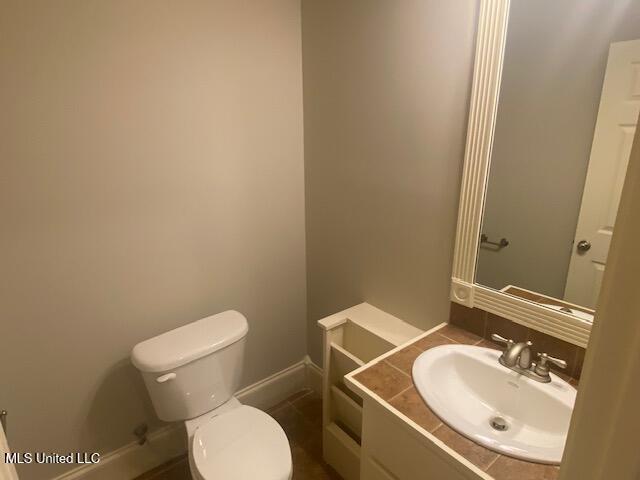 309 Barrington Cv, Byram, MS 39272 - bathroom featuring toilet and vanity