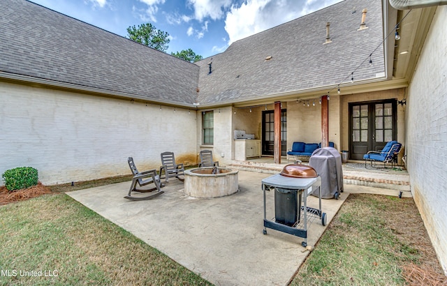 view of patio with a fire pit