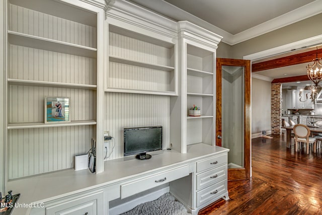 home office with a chandelier, dark hardwood / wood-style flooring, and crown molding