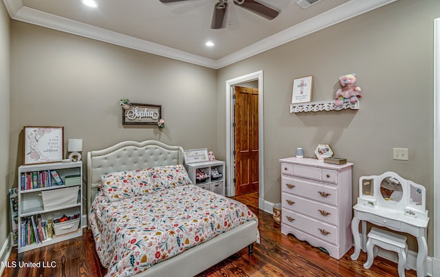 bedroom featuring dark hardwood / wood-style floors, ceiling fan, and crown molding