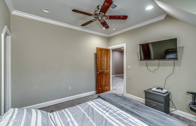 unfurnished bedroom featuring carpet flooring, ceiling fan, vaulted ceiling, and ornamental molding