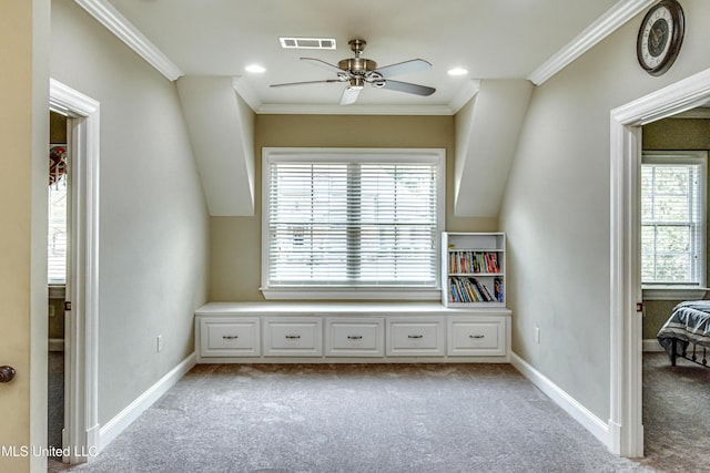 unfurnished room featuring light carpet, crown molding, and ceiling fan