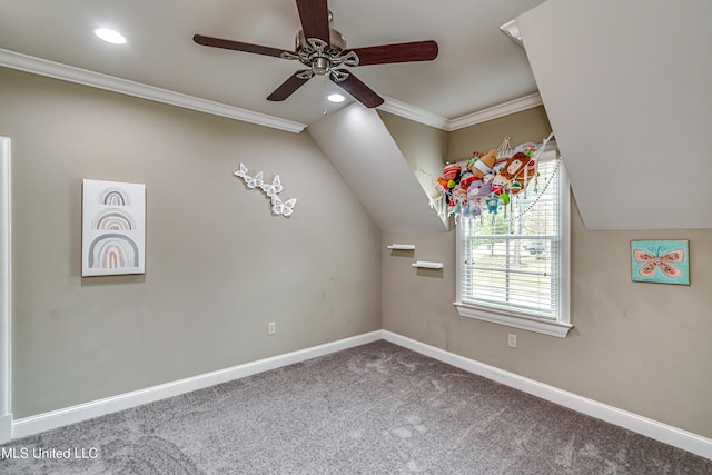 additional living space featuring carpet floors, ceiling fan, and lofted ceiling