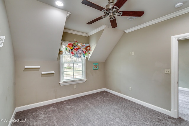 additional living space with carpet flooring, ceiling fan, and lofted ceiling