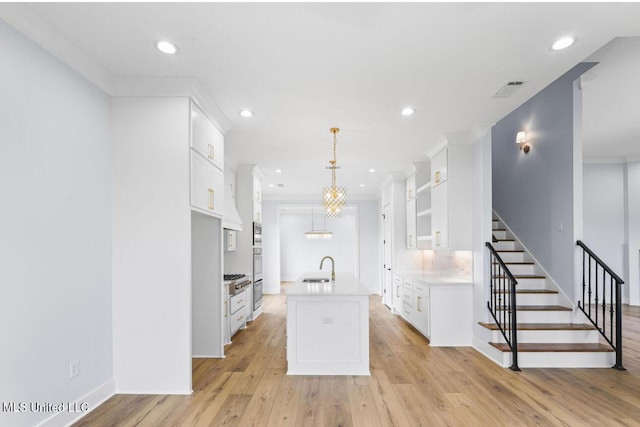 135 Genoa Dr, Madison, MS 39110 - kitchen featuring open shelves, recessed lighting, light countertops, white cabinets, and light wood finished floors