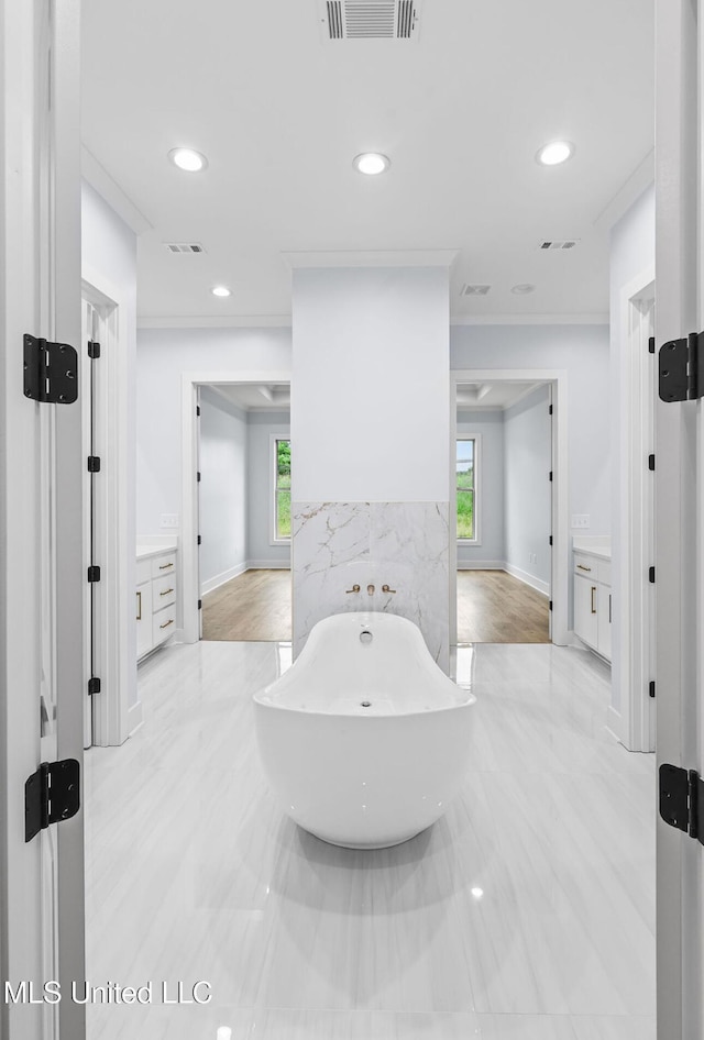 135 Genoa Dr, Madison, MS 39110 - full bathroom featuring a freestanding bath, recessed lighting, vanity, and ornamental molding