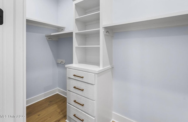 135 Genoa Dr, Madison, MS 39110 - spacious closet with dark wood finished floors