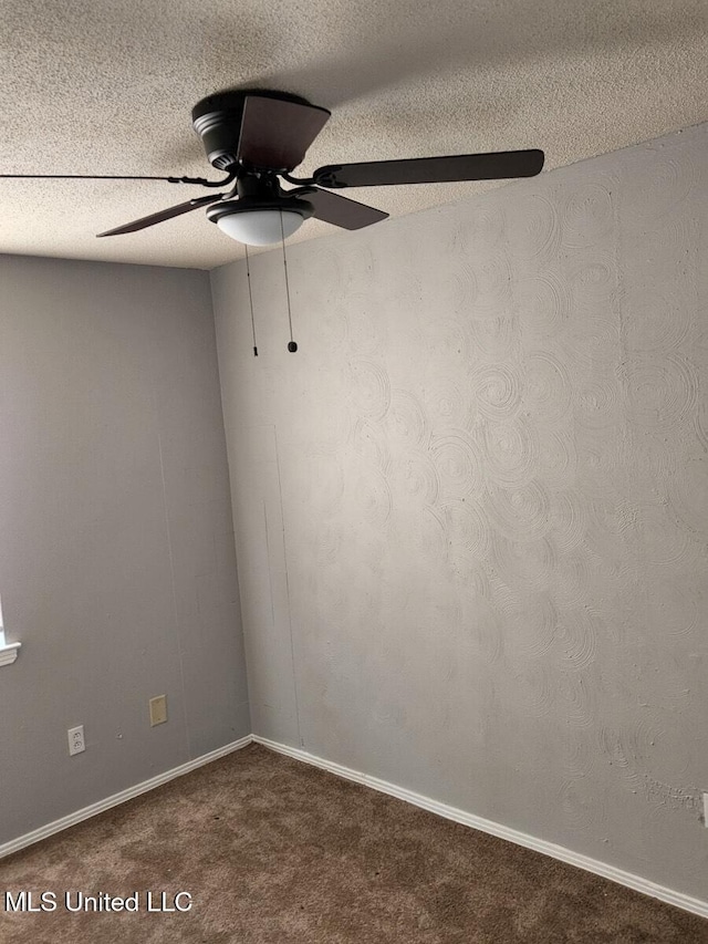 2067 Corry Rd, Memphis, TN 38106 - carpeted empty room featuring a textured ceiling, ceiling fan, and baseboards
