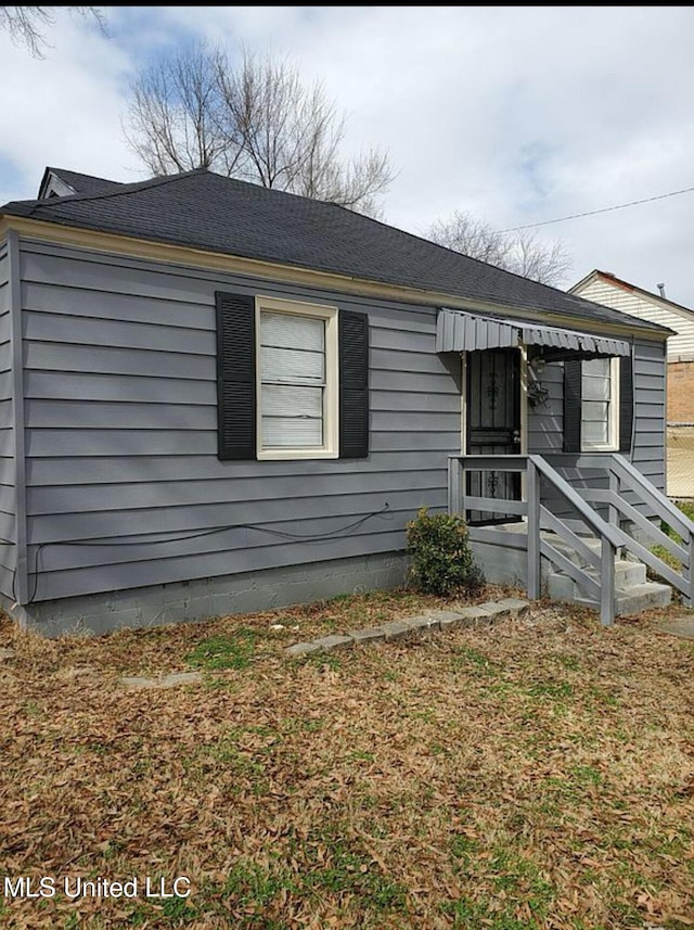2067 Corry Rd, Memphis, TN 38106 - view of front of property featuring roof with shingles