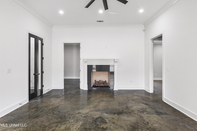 unfurnished living room with finished concrete flooring, baseboards, visible vents, a fireplace, and recessed lighting