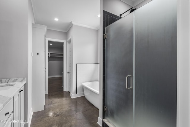 full bath featuring a stall shower, a spacious closet, concrete flooring, vanity, and a freestanding tub