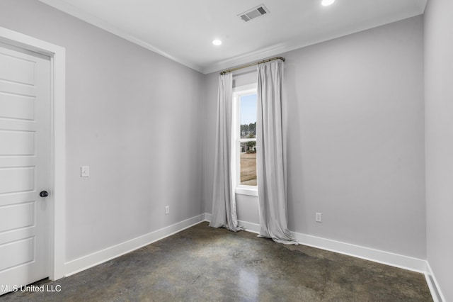 spare room with concrete flooring, recessed lighting, visible vents, baseboards, and crown molding