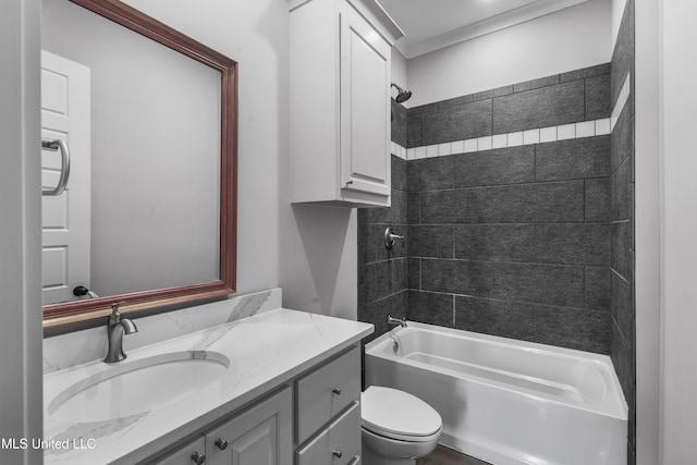 full bath featuring tub / shower combination, vanity, and toilet