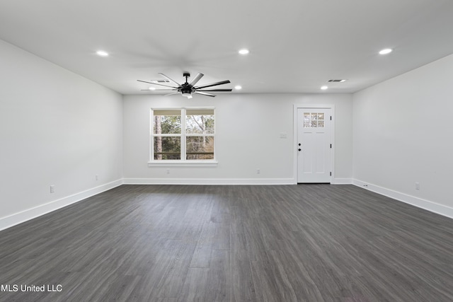 interior space featuring visible vents, baseboards, ceiling fan, dark wood finished floors, and recessed lighting